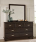 Covetown King Panel Bed with Mirrored Dresser and Nightstand